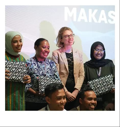 american flag in the middle of grass field on sunset